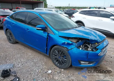 2015 Ford Focus Titanium from USA, damaged, VIN 1FADP3J27FL287249